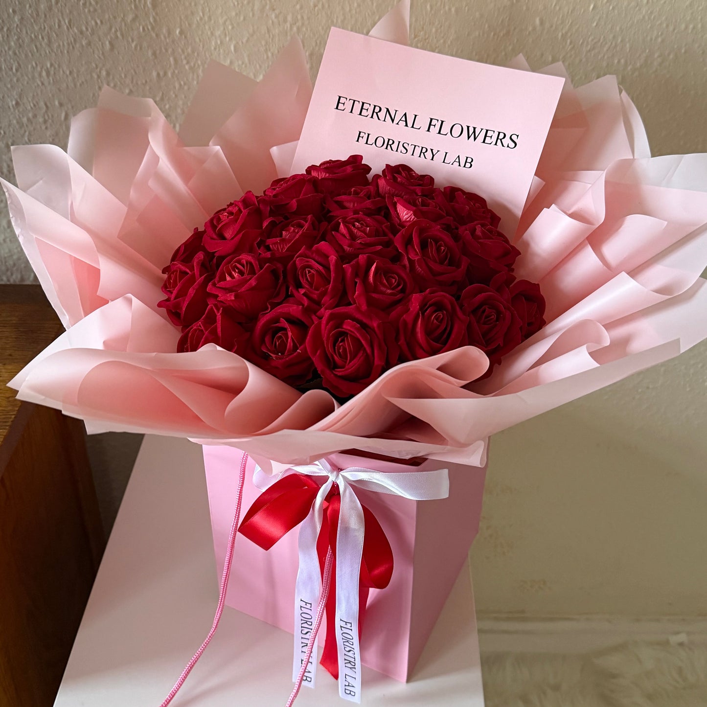 24 Red Eternal Roses - Pink Wrap