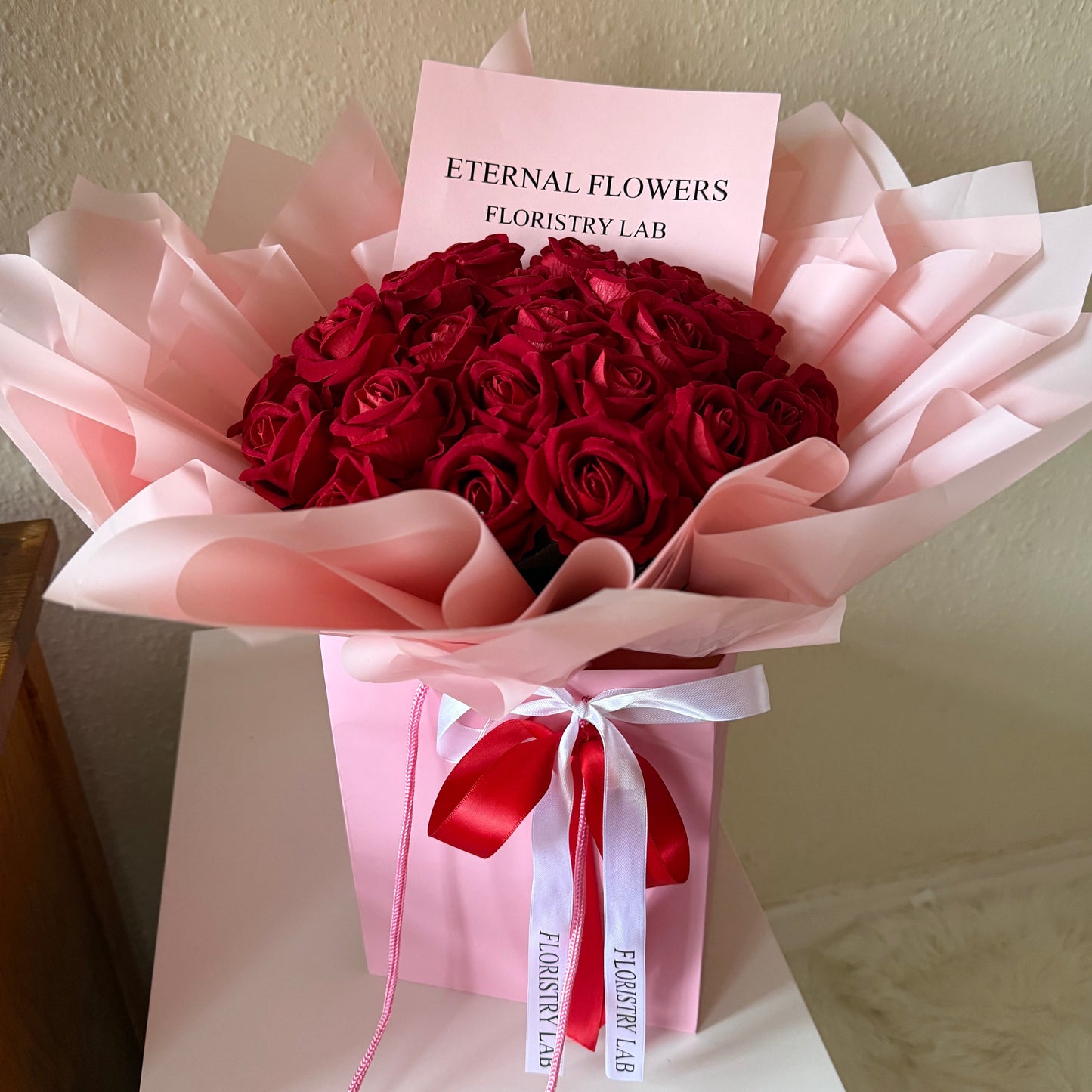 24 Red Eternal Roses - Pink Wrap