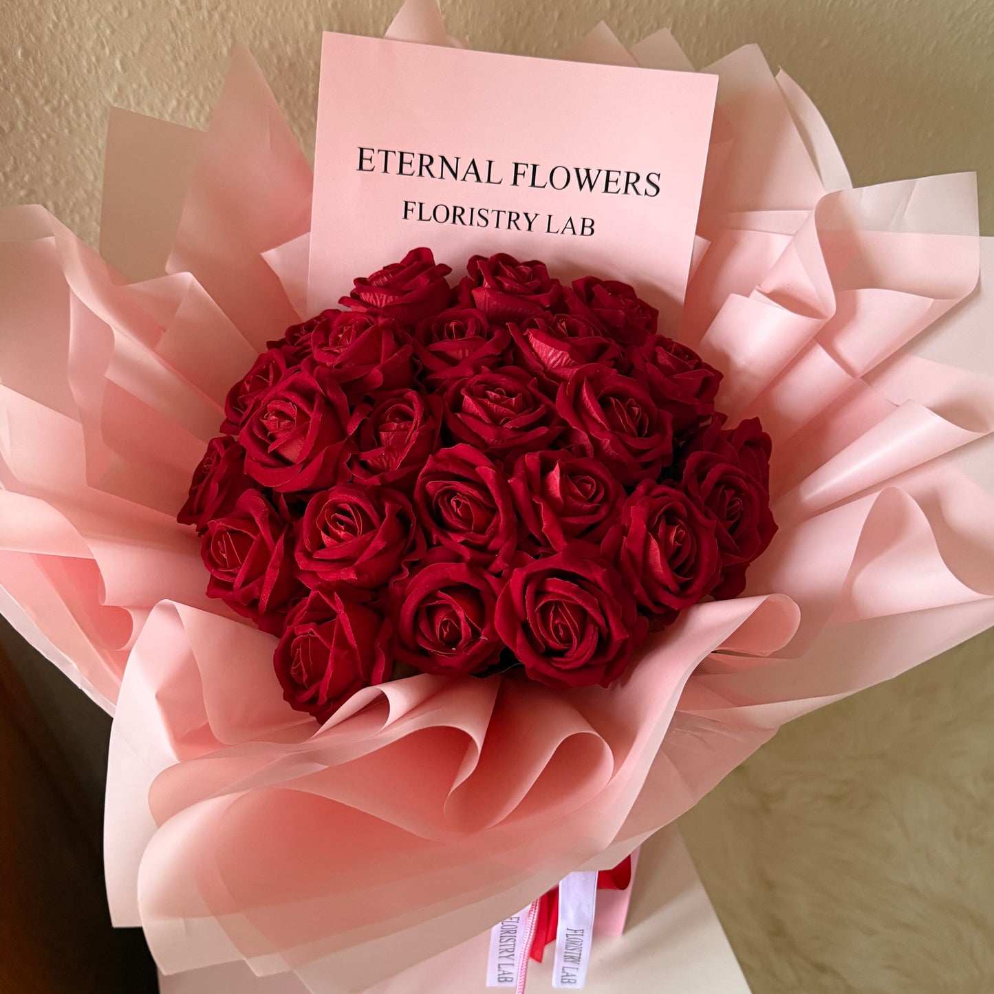 24 Red Eternal Roses - Pink Wrap