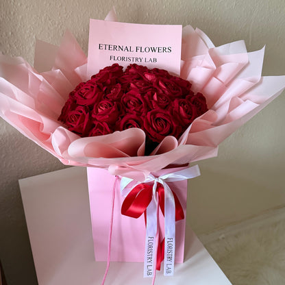 24 Red Eternal Roses - Pink Wrap